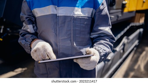 Closeup Mobile Tablet For Control Drilling Rig For Exploration Of Minerals For Oil, Gas And Artisan Water.