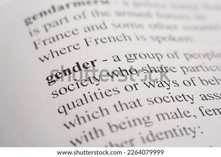 A closeup mockup of a dictionary of the word Gender