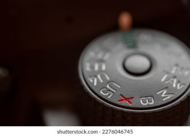 closeup of a mode dial of a digital camera