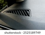 Close-up of Modern Car Dashboard Air Vent Grille - Interior Detail