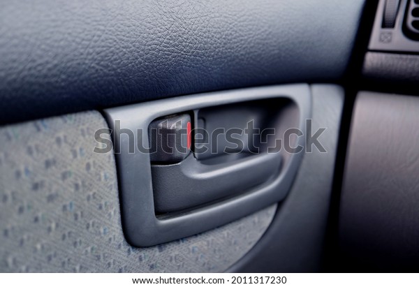Closeup of modern car\'s\
inner door handle