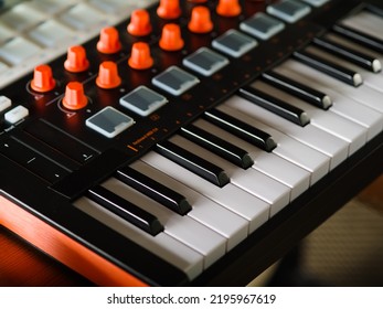 Close-up. Modern Electronic Musical Instrument - Midi Keyboard. Professional Equipment For A Recording Studio. There Are No People In The Photo.