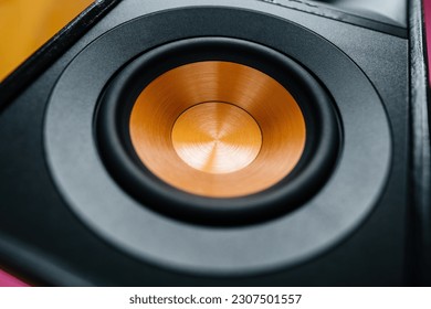A close-up of a modern, high-end sound system consisting of black loudspeakers and expensive audio equipment for a professional studio or club or living room - cooper woofer