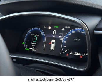 Close-up of a modern hybrid car’s digital dashboard showing driving modes like Eco, Charge, Power, speed, temperature, and system alerts. Clean UI and high-tech concept for future mobility visuals. - Powered by Shutterstock - Get 15% off with code: PIKWIZARD15