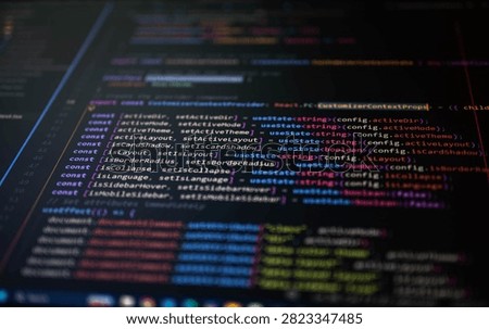 Close-up of modern programming code on a computer screen with selective focus and colorful syntax highlighting, representing software development, coding, web technology, cybersecurity, programming and digital innovation.