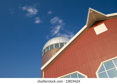 Closeup Of A Modern Red Barn And A Silo