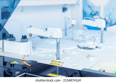 Closeup Modern Robotical Machine For Centrifuge Testing Sample Tube With Blood. Medical Laboratory Equipment Automatic Biomedical Analyzer, Blue Color.