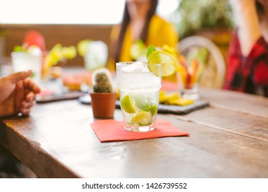 Close-up of mojito cocktail on the table -  summer party with friends, birthday  celebration concept