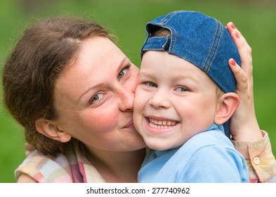 Closeup Mom Kissing Son On Cheek Stock Photo 277740962 Shutterstock