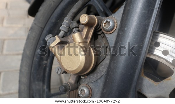 Close-up\
of motorcycle brakes, motorcycle brake disc\
\
\
