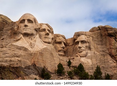 Close-Up of Mount Rushmore on a Cloudy Day - Mount Rushmore National Memorial - Shutterstock ID 1499234930