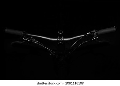 close-up mountain bicycle on black background         