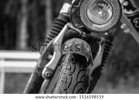 Similar – Image, Stock Photo Wheel and exhaust pipe of motorcycle on road