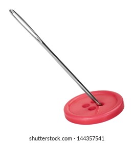 Close-up of a needle in the button hole