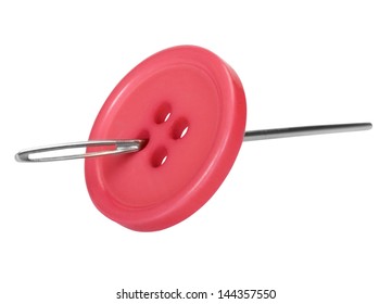 Close-up of a needle in the button hole