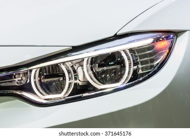 Closeup Of New Projector Headlight On The Modern Car.