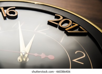 Closeup Of New Year 2017 Lie On Clock Face - Dial. The End Of 2016. Happy Holiday Time.