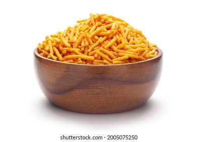 Close-up Of Nimbu Masala Besan Sev Indian Namkeen (snacks) In Hand-made (handcrafted) Wooden Bowl Over White Background.