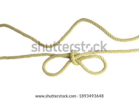 Closeup of a node or knot and two ropes isolated on a white background. Navy and angler knot.