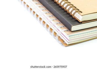 Closeup of notebooks stack isolated on white background