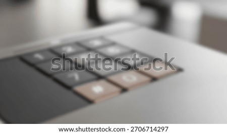 Close-up of a numeric keypad, ideal for security system concepts.