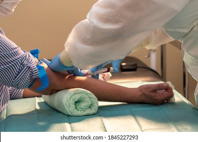 Close-up Of Nurse Drawing Blood From A Patient For A Blood Test
