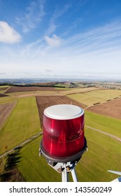 Closeup Of Obstruction Light On Wind Turbine's Farm