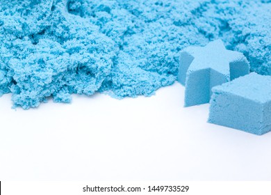 Closeup Og Blue Kinetic Sand On The White Background. Kids Development Concept.