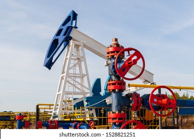 Close-up Of An Oil Pump Jack In Idle Condition. Oil, Gas Industry. 