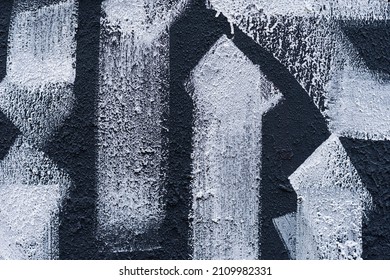 Close-up old black and white painted scratched wall, abstract drawings geometric paint, for background