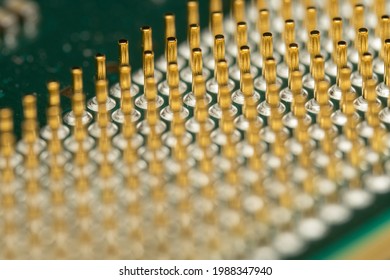 Closeup of old CPU Computer Processor with pins and green PCB