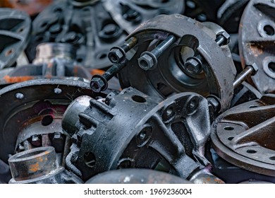 Close-up Of Old Engine Parts, Piled Up For Sale In A Metal Scrapyard.