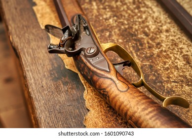 A Closeup Of An Old Flintlock Rifle.