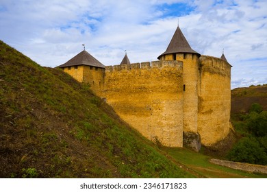 closeup old medieval castle among green hills, open air museum scene - Shutterstock ID 2346171823