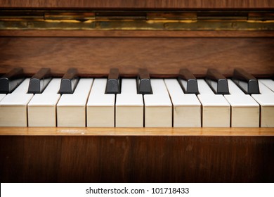 Closeup Of Old Piano Keyboard.