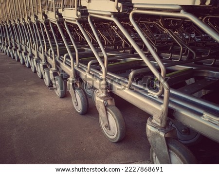 Similar – Image, Stock Photo Shopping cart wheel