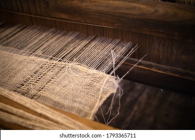 Closeup of an old traditional Sardinian Weaving Loom with Wool Yarn
