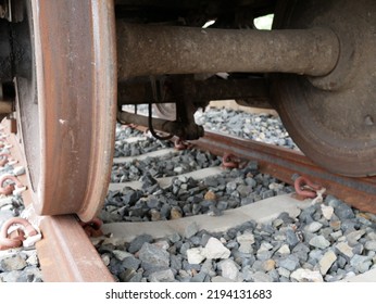 Closeup Of Old Train Wheels On The Train Track.