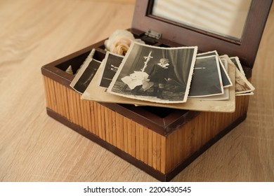 Close-up Old Vintage Photos 50s, 60s Sepia Color In Brown Wooden Box, Chest, Concept Of Antique Treasure, Family Tree, Genealogy, Memory Of Ancestors, Family Ties, Childhood Memories