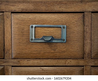 Close-up old vintage wooden library card catalog cabinets.