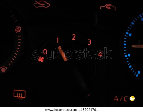 Closeup on Air conditioner controller on dashboard
panel car