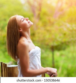 Closeup On Beautiful Calm Woman Enjoying Nature On Terrace In Luxury Cottage, Spa Resort, Zen Balance, Summer Vacation, Harmony Conception