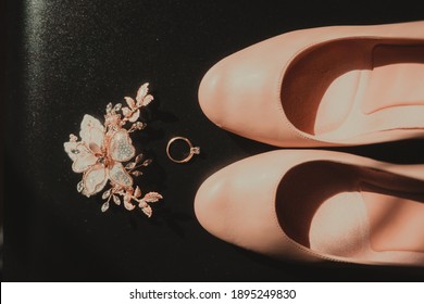 Close-up On Bride Beautiful Pink Wedding Shoes Engagement Ring And Ceremony Hair Piece