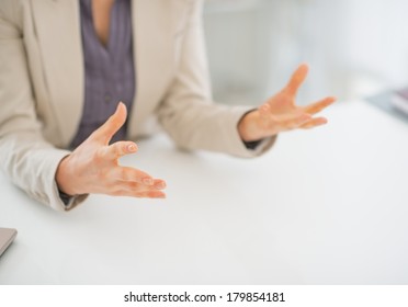 Closeup On Business Woman Explaining Something Using Hands