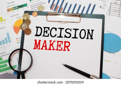 Closeup On Businessman Holding A Card With DECISION MAKER Message, Business Concept Image With Soft Focus Background And Vintage Tone