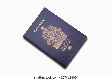 Close-up On A Canadian Passport Isolated On A White Background.