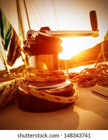 Closeup On Crank Handle Of Yacht In Warm Yellow Sunset Light, Sailboat Detail, Active Lifestyle, Water Sport, Luxury Transport, Summer Tourism Concept