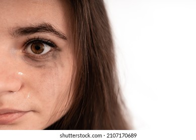 Close-up on a crying girl who has smudged make up, young woman suffering from severe depression, anxiety,sadness, crying, tears coming from her eyes, stop violence - Shutterstock ID 2107170689
