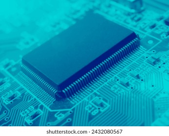 Closeup on electronic computer board. Electronic circuit board with processor microchips and other computer parts, close up. Repair service and technology concept.