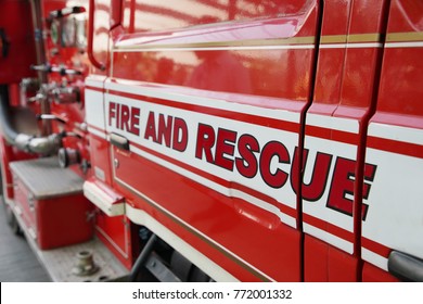 close-up on fire and rescue words on the red fire truck